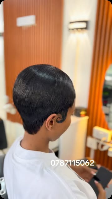 Short sculpted style with a tapered nape